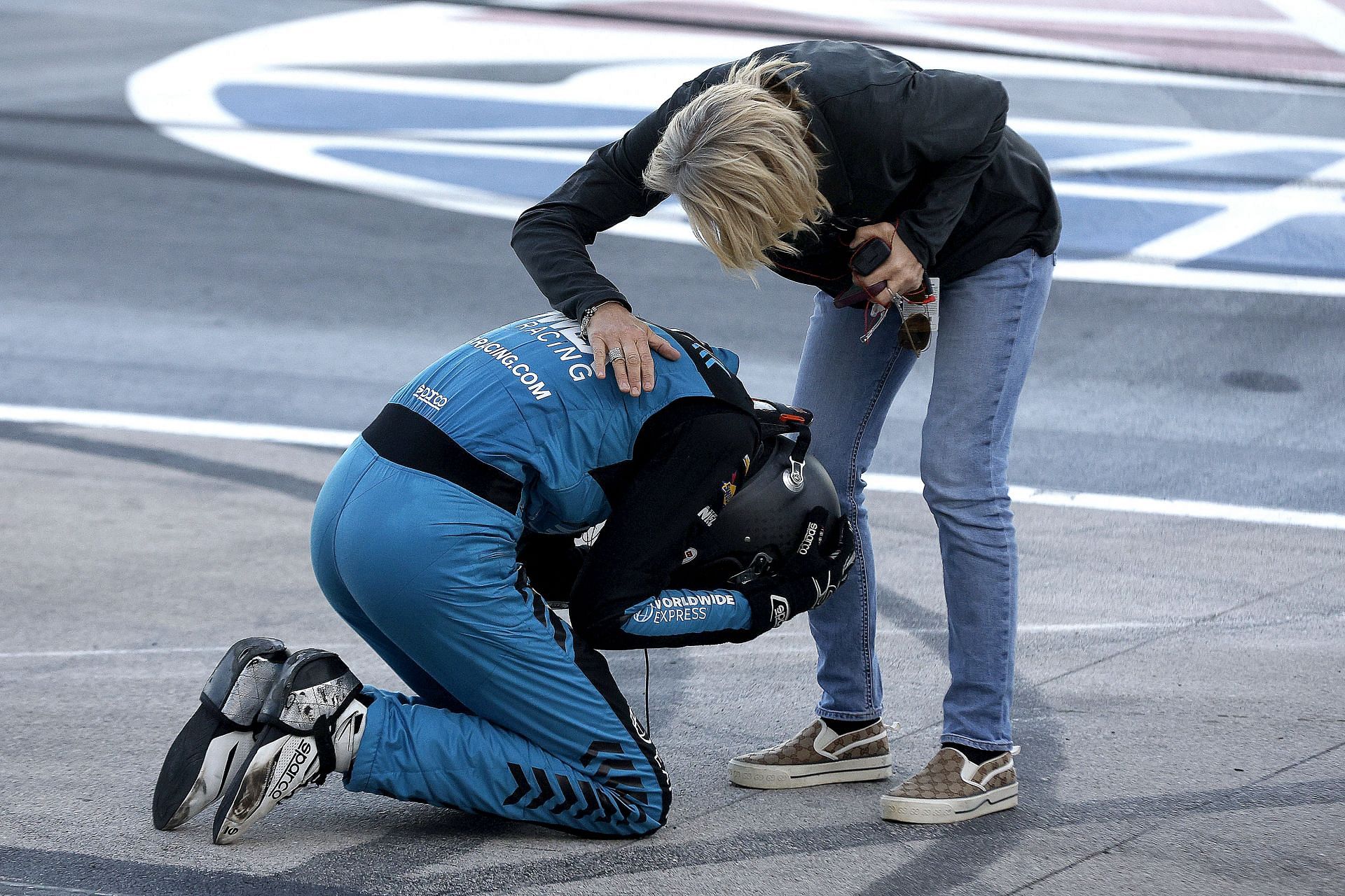 Carson Hocevar with his mother Amy Hocevar after winning the 2024 NASCAR Craftsman Truck Series SpeedyCash.com 250 in Texas. Source: Getty